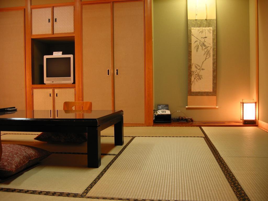 Hotel Tomiya Shin'onsen Habitación foto
